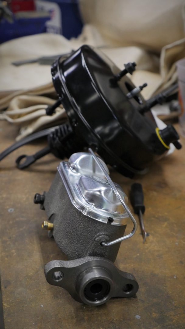 The power brake retrofit (in this case) uses a compact vacuum booster and master cylinder for a later Fox Body Mustang.