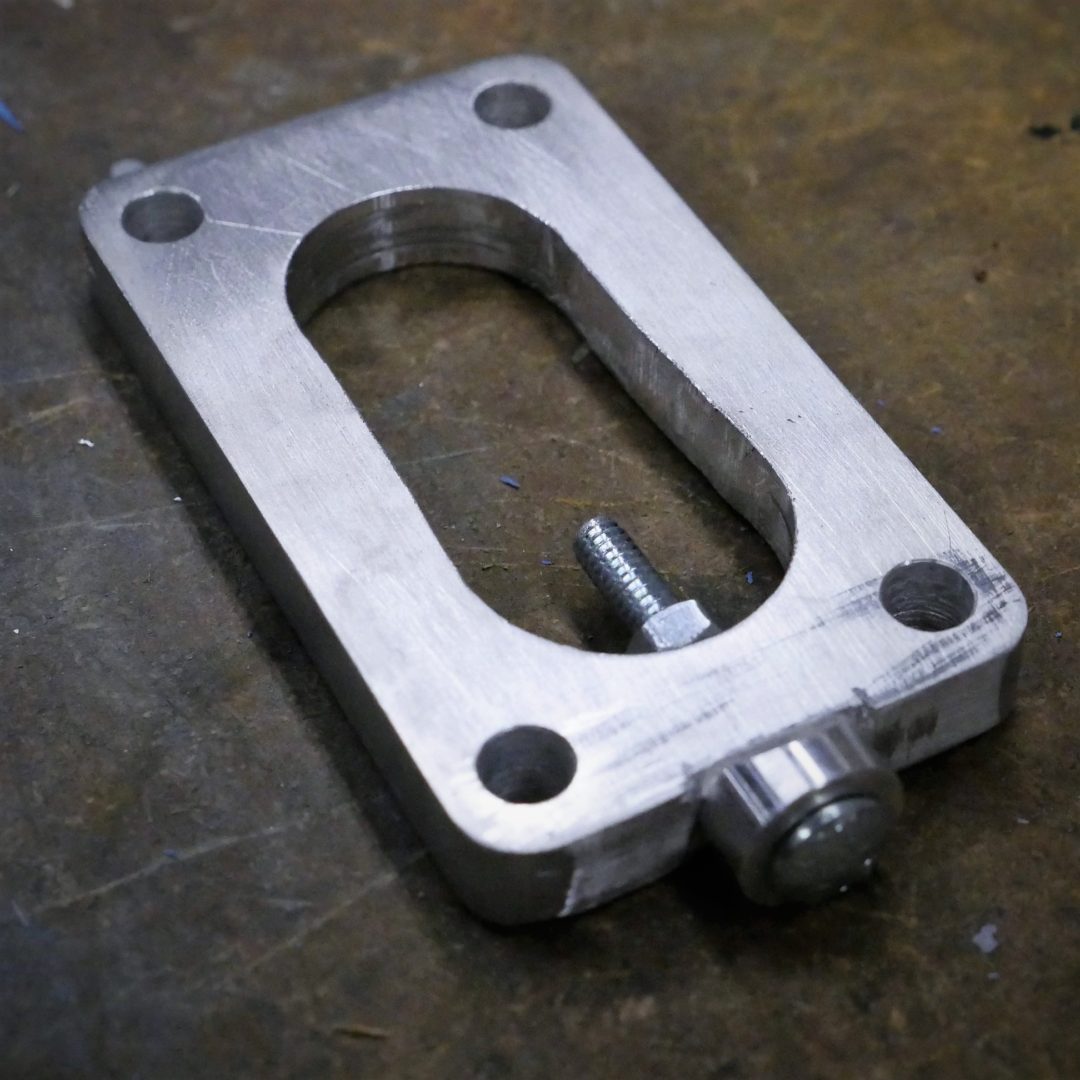 Custom carb spacer with port