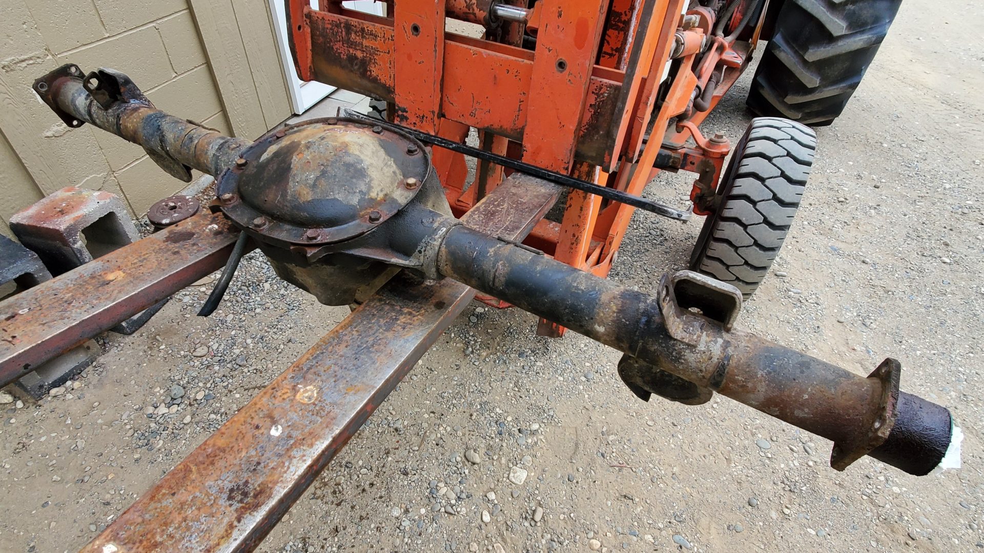 S10 4X4 Axle - Stripped. The old spring perches will be cut off and replaced. Brakes, hardware, and seals freshened up. 