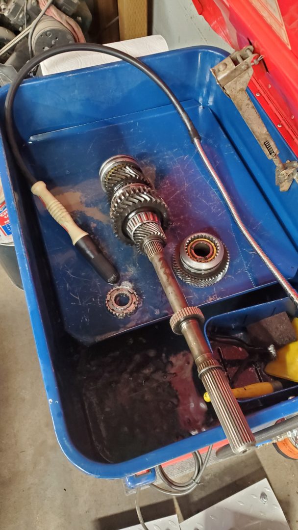 T-5 Transmission parts get cleaned and degreased prior to rust removal. The case will get washed out too.