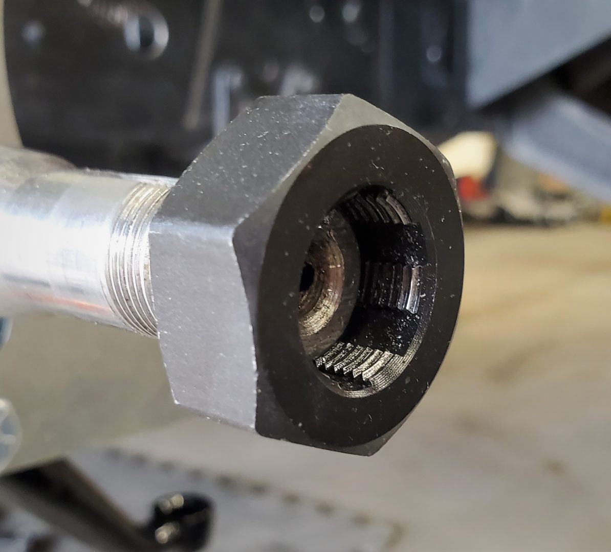 Spindle rethreading die helped 'restore' them.