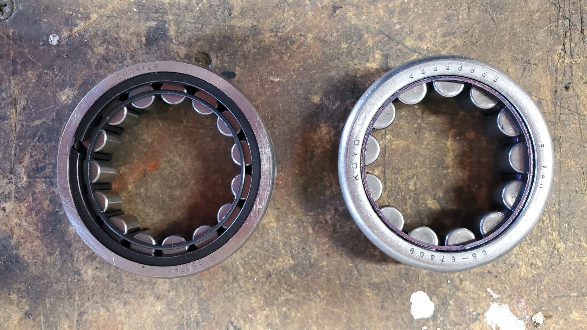 An inexpensive Chinese wheel bearing on the left from NAPA Auto vs a quality KOYO bearing on the right. The Chinese bearing had poor machine tolerances and almost 'fell' into the axle housing where it should be a tight press fit. We installed the bearing on the right which had to be driven in, as it should.