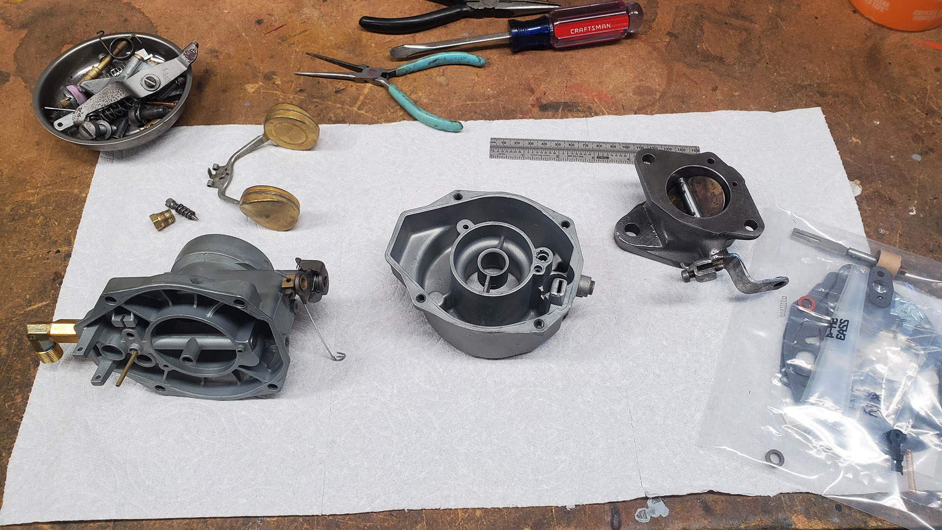 Rochester carburetor parts ready for reassembly